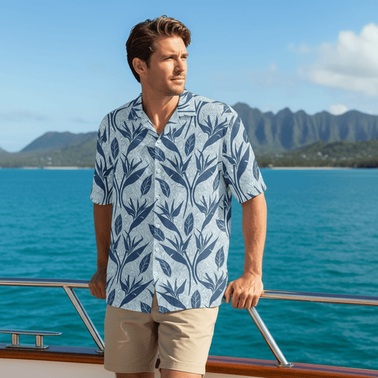 Man wearing Twilight Voyage Hawaiian shirt on yacht deck cruising Hawaiian coastline