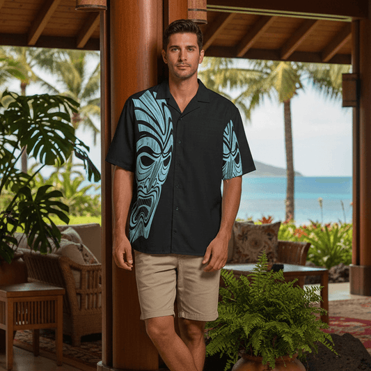 Man wearing Twisted Tiki Phantom Hawaiian shirt leaning against pillar in luxury resort lobby
