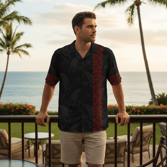 Man wearing Pō Koa o ke Kai ʻElua Hawaiian shirt leaning against railing at resort bar terrace overlooking ocean
