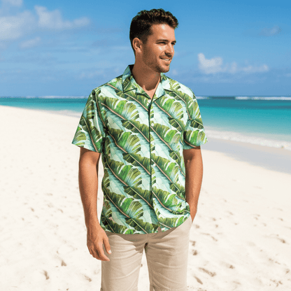 Hilo Harmony shirt lifestyle photo - person wearing shirt on white sand beach with turquoise ocean