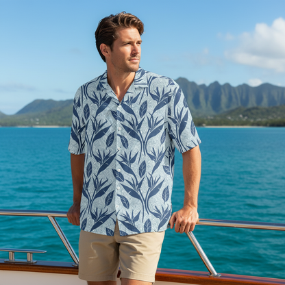 Man wearing Twilight Voyage Hawaiian shirt on yacht deck cruising Hawaiian coastline